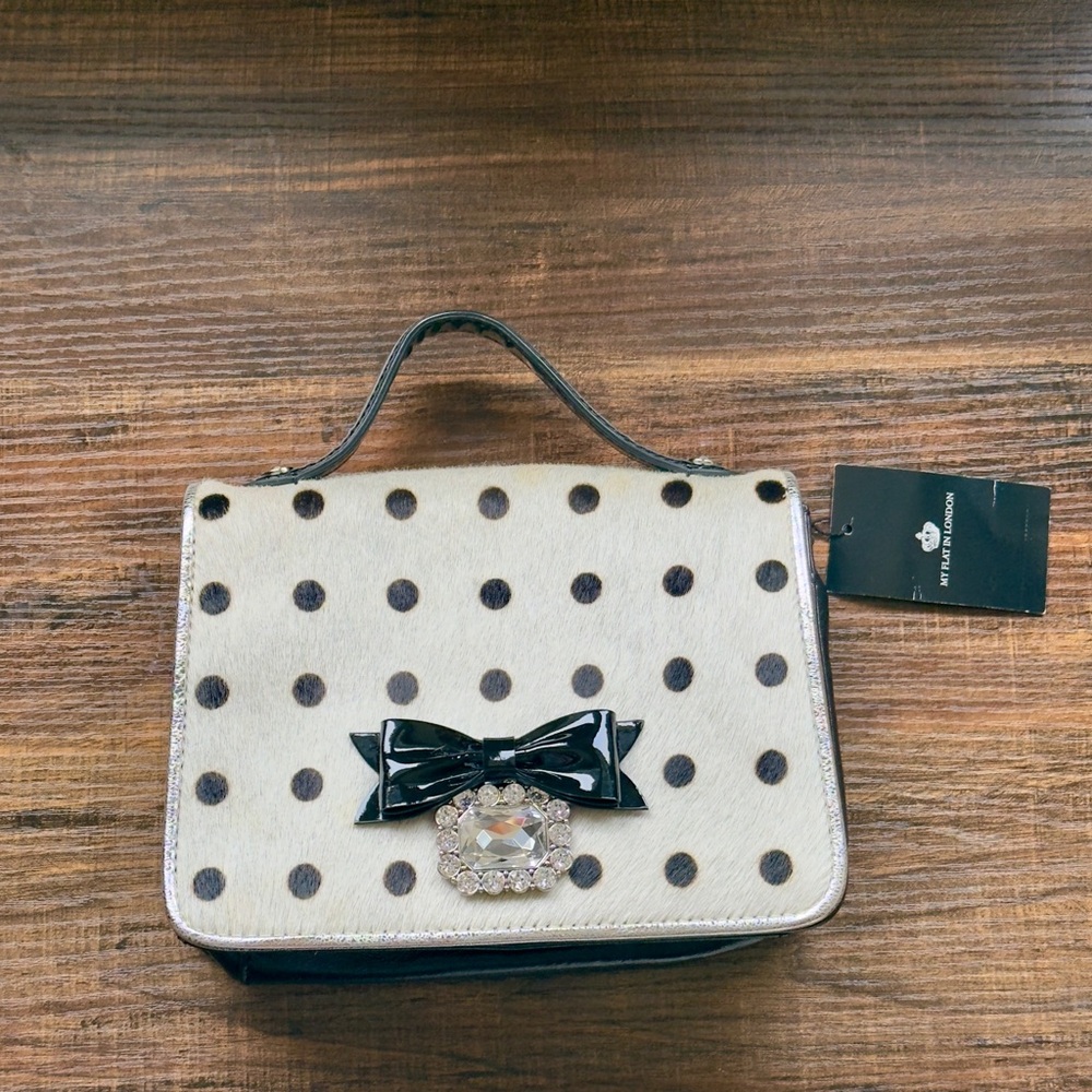 Elegant Polka Dot Handbag with Black Accents